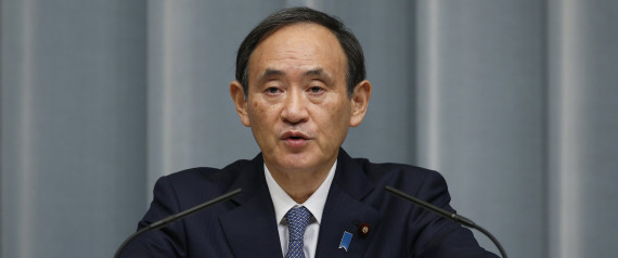 Japan's Chief Cabinet Secretary Yoshihide Suga speaks to the media during a press conference at Prime Minister's official residence in Tokyo, Wednesday, Feb. 10, 2016. (AP Photo/Shizuo Kambayashi)